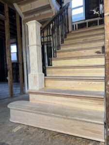 A finished stair with wooden flooring